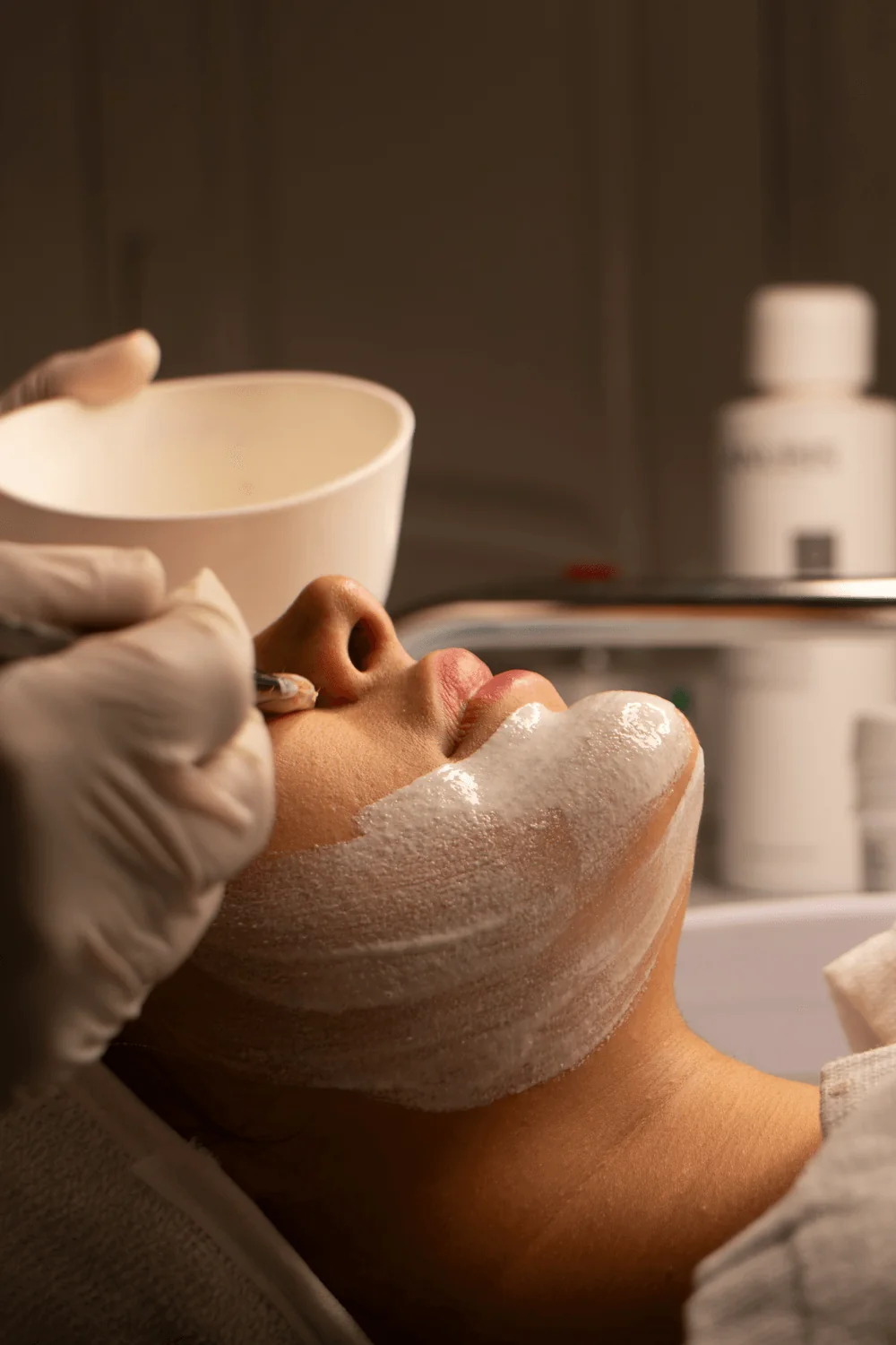 A facial mask applied during a skin treatment